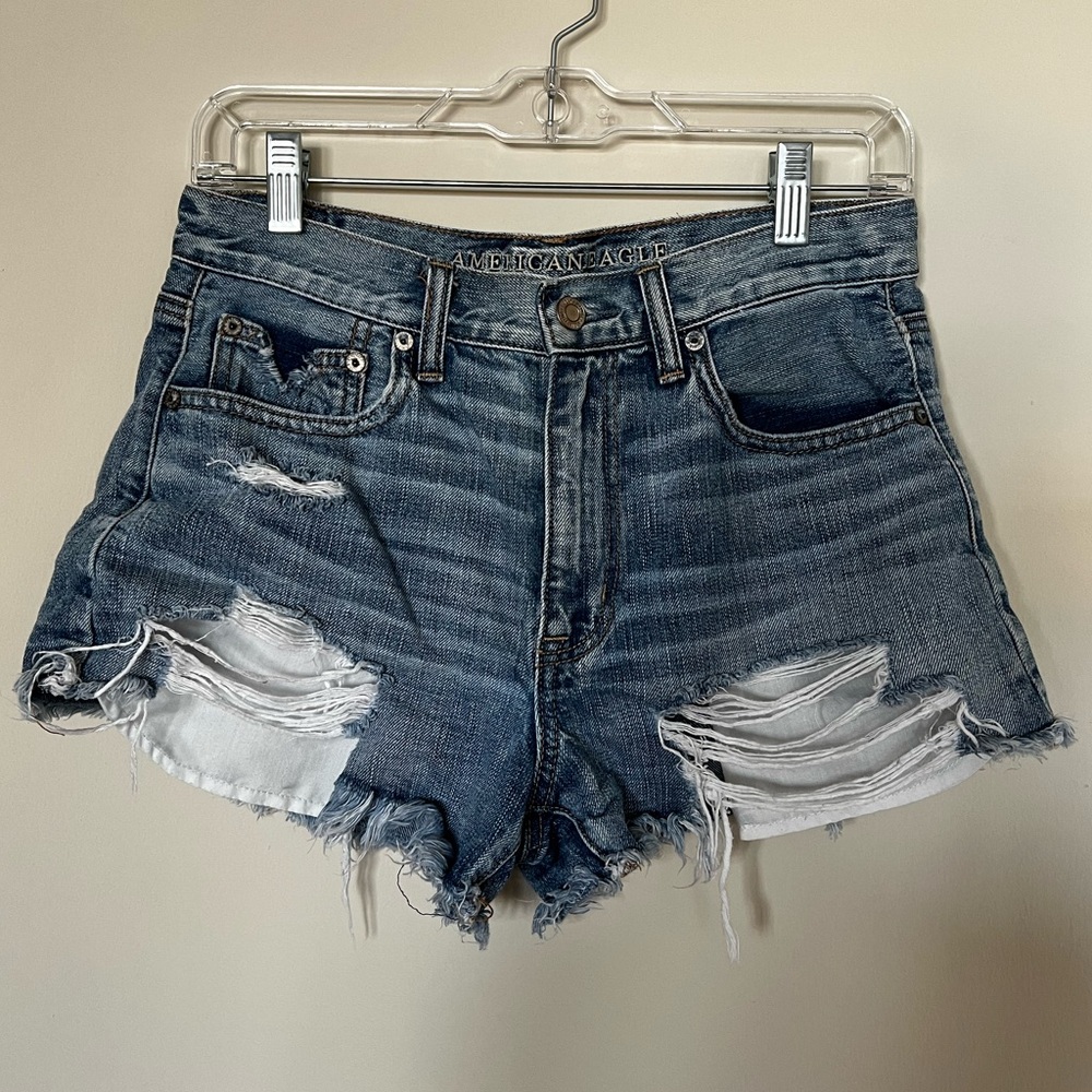 Vintage Hi-Rise Festival distressed jean shorts